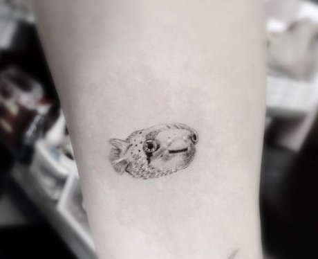 Miley Cyrus's Puffa Fish tattoo