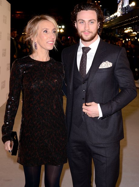 Sam Taylor Wood and Aaron Johnson on the grey carpet