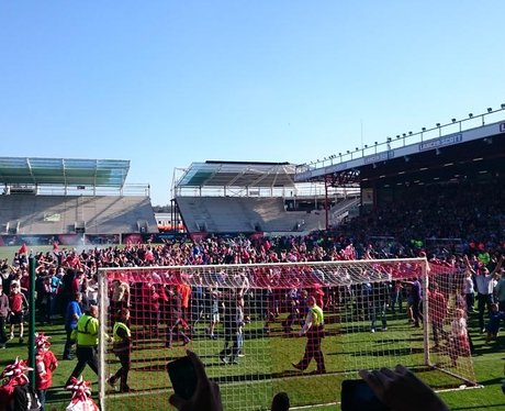 Fans Flood the Pitch