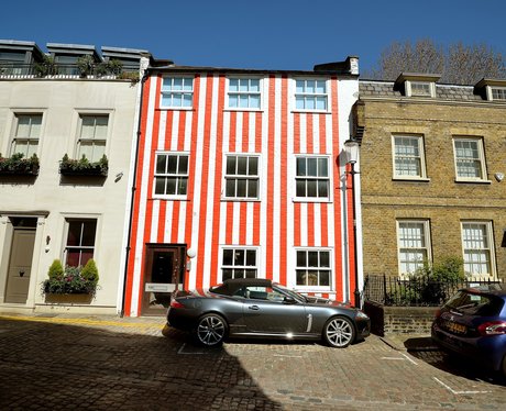 Stripy house on a posh street