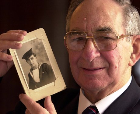 Albert 'Joe' Barnes with a photo of himself