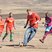 Image 7: Prince Harry playing football with orphaned children during his visit to Africa