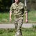 Image 8: Prince Harry going to meet troops from the Estonian army