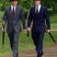 Image 3: Prince Harry and Prince William wearing matching bowler hats and ties