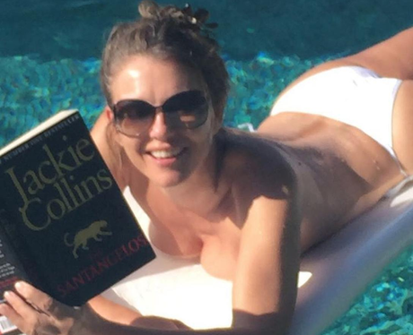 liz hurley reading in pool instagram