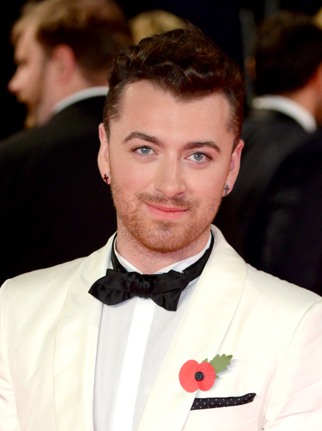 Sam Smith in a white tuxedo