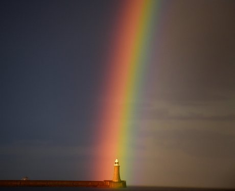 Rainbow over a lighthouse