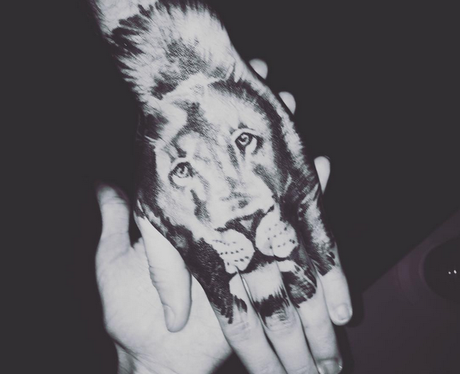 Liam Payne lion hand tattoo