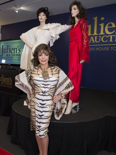 Joan Collins in animal print dress