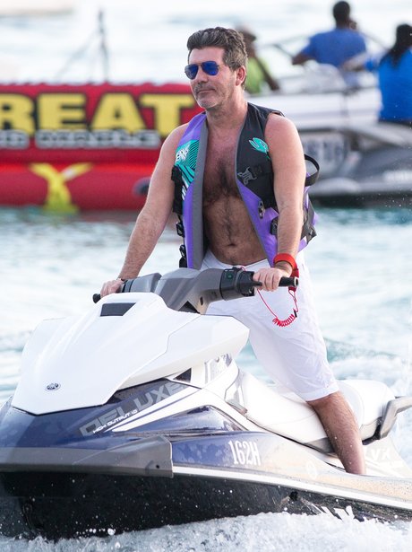 Simon Cowell jet skiing on holiday