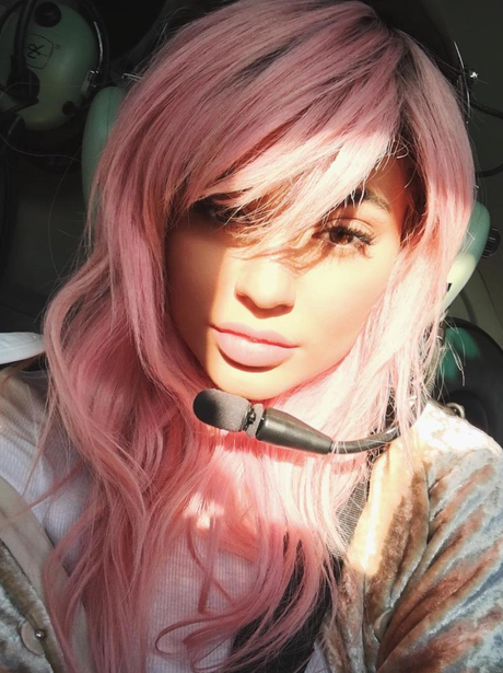 Kylie Jenner debuts new pink hair on helicopter ri