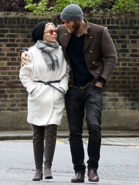Kylie Minogue and fiancé Joshua Sasse walking