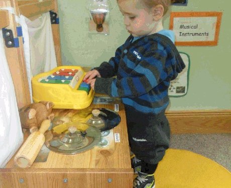 Liam Fee playing at nursery