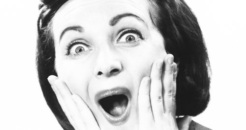 Shocked retro woman black and white