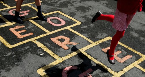 Children playing hopscotch