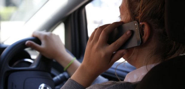 Woman on the phone while driving