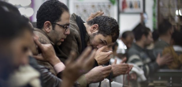 Muslims pray inside a mosque