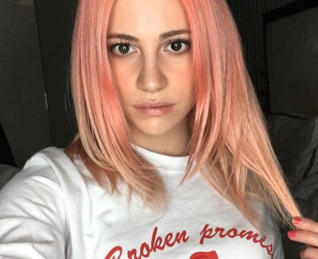Pixie Lott shows of a drastic new hair do!