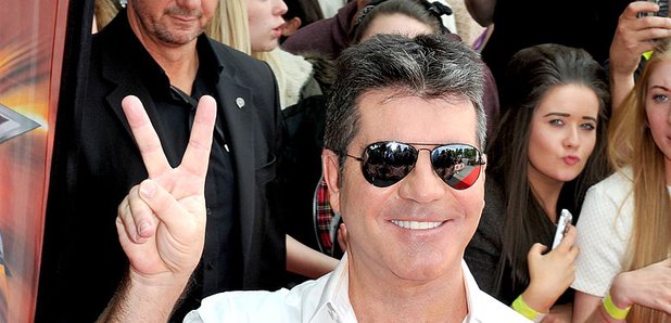 What is Simon Cowell&39s net worth and who is his partner Lauren Silverman?