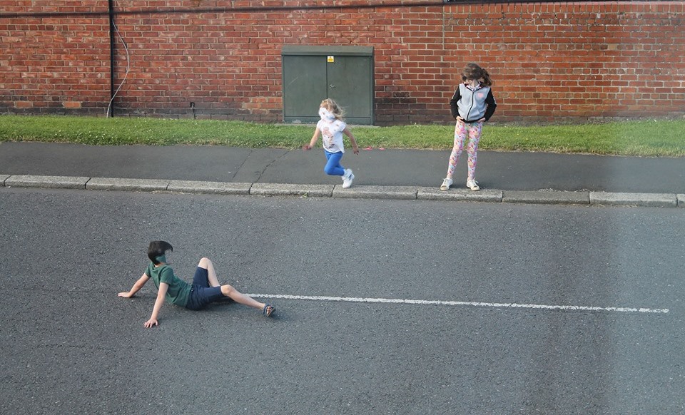 Children play chicken on the streets of Washington