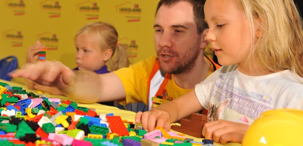 Child & Lego Workman playing with Lego