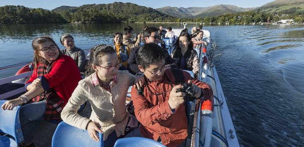 Chinese tourists enjoy the Lakes