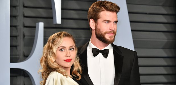 Miley Cyrus and Liam on red carpet
