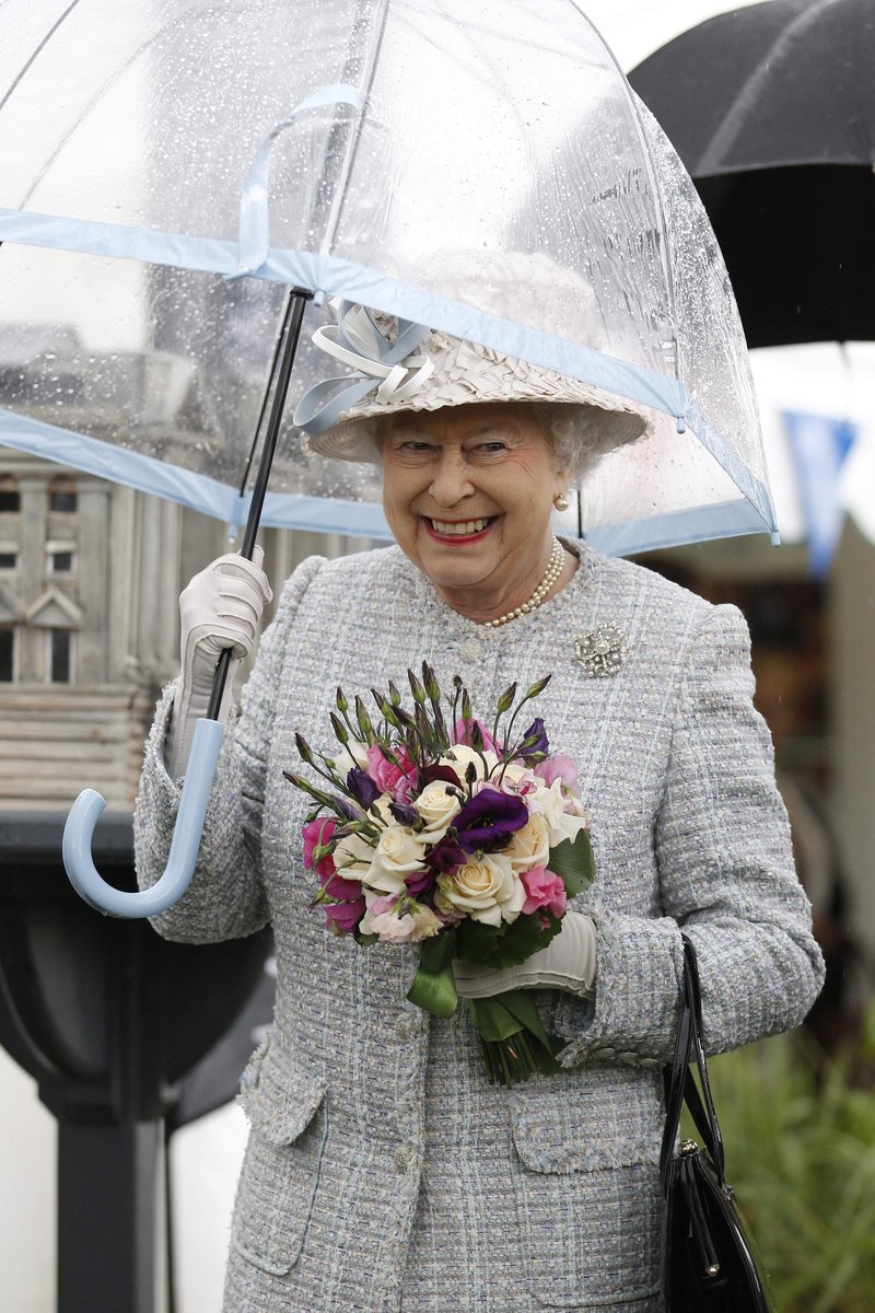 Why the Queen insisted on always holding her own umbrella