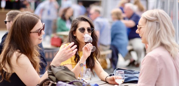 People drinking wine