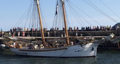 tall ship enters her home port in Cornwall