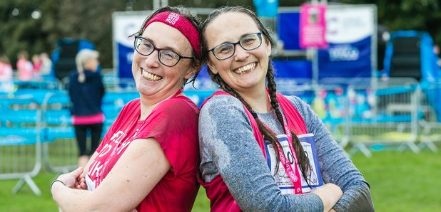 Two ladies smiling after a race