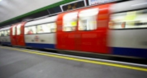 tube train going through station