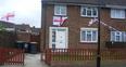 Image 1: England flags outside Bedford house