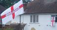 Image 9: Flags outside Bedford house