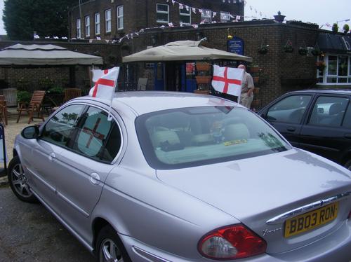 England flags on car in Bedford